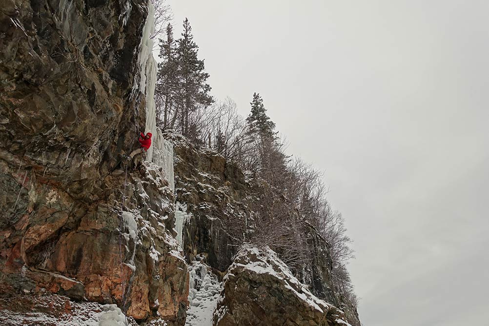  Nathan Kutcher on the first ascent of SBLOUNSKCHED! M6+. 
